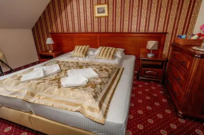 Łóżko lub łóżka w pokoju w obiekcie Resort Morawa