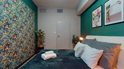 Łóżko lub łóżka w pokoju w obiekcie Aparthotel Market Square TectumApartments