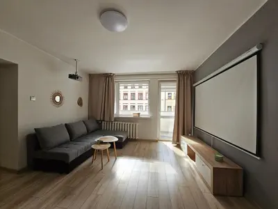 Część wypoczynkowa w obiekcie Cozy apartment 5 min walk from Rynek square