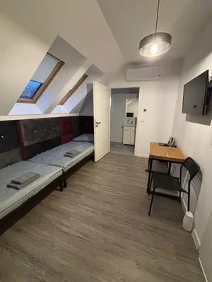 Telewizja i/lub zestaw kina domowego w obiekcie Pokoje Pod Pałacem