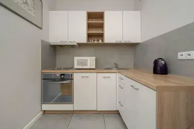 Kuchnia lub aneks kuchenny w obiekcie Jesionowa 37 Elegancki Apartament i Parking by Noclegi Renters