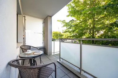 Balkon lub taras w obiekcie Jesionowa 37 Elegancki Apartament i Parking by Noclegi Renters