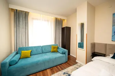 Łóżko lub łóżka w pokoju w obiekcie Apartamenty Castello