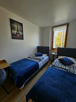Łóżko lub łóżka w pokoju w obiekcie Apartament Radiostacja V, parking free