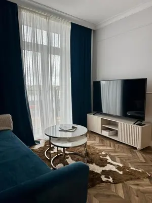 Telewizja i/lub zestaw kina domowego w obiekcie Apartament OPAL2 Mickiewicza