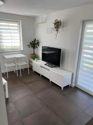 Telewizja i/lub zestaw kina domowego w obiekcie Domek w górach