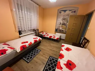 Łóżko lub łóżka w pokoju w obiekcie Apartament Kudowa Zdrój - Słone 60m2