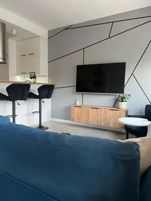Telewizja i/lub zestaw kina domowego w obiekcie Pomorska Apartment