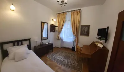 Łóżko lub łóżka w pokoju w obiekcie Zamek na wodzie w Wojnowicach