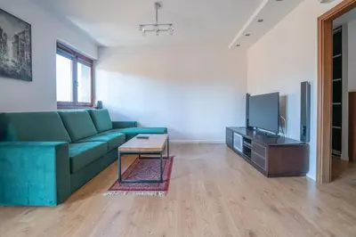 Telewizja i/lub zestaw kina domowego w obiekcie Apartament Werona Check-in 24h AirCon Privat Parking