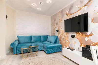 Telewizja i/lub zestaw kina domowego w obiekcie Feels Like Home Premium Apartment by BookingHost