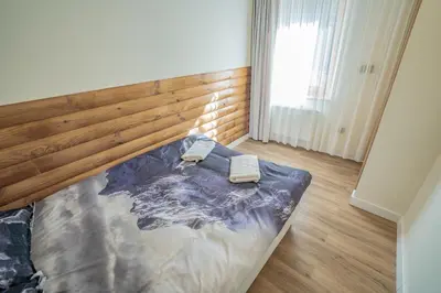 Łóżko lub łóżka w pokoju w obiekcie Apartamenty Alegrima