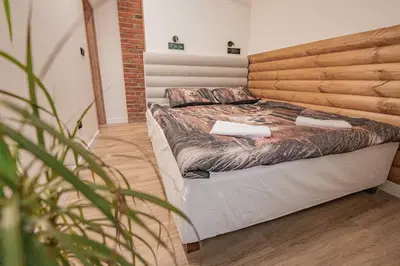 Łóżko lub łóżka w pokoju w obiekcie Apartamenty Alegrima
