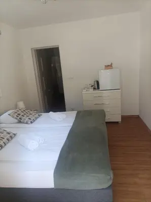 Łóżko lub łóżka w pokoju w obiekcie Rzeka Miodu