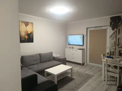 Telewizja i/lub zestaw kina domowego w obiekcie Apartament pod Złotym Bocianem