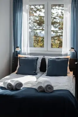 Łóżko lub łóżka w pokoju w obiekcie Apartament Pogodny Widok