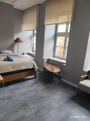 Łóżko lub łóżka w pokoju w obiekcie Apartament Grey