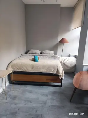 Łóżko lub łóżka w pokoju w obiekcie Apartament Grey