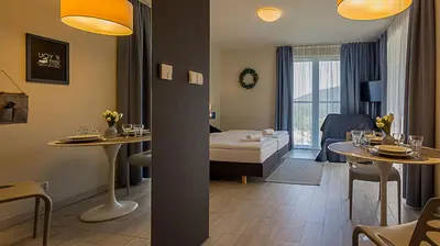 Łóżko lub łóżka w pokoju w obiekcie VacationClub - Solden Apartament 15