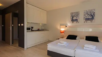 Łóżko lub łóżka w pokoju w obiekcie VacationClub - Solden Apartament 15