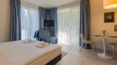 Łóżko lub łóżka w pokoju w obiekcie VacationClub - Solden Apartament 15