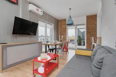 Telewizja i/lub zestaw kina domowego w obiekcie Beautiful Apartment with Spacious Balcony by Noclegi Renters