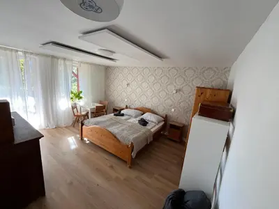 Łóżko lub łóżka w pokoju w obiekcie Apartament Parkowy