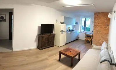 Kuchnia lub aneks kuchenny w obiekcie Apartament Parkowy