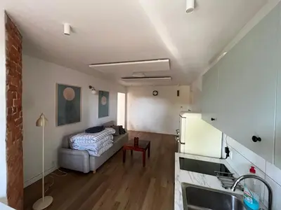 Łóżko lub łóżka w pokoju w obiekcie Apartament Parkowy