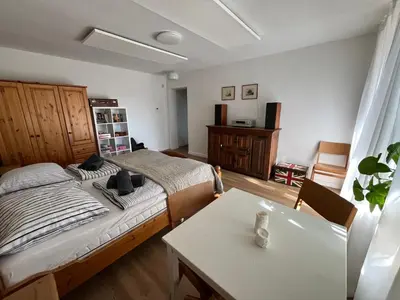 Łóżko lub łóżka w pokoju w obiekcie Apartament Parkowy