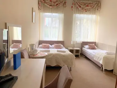 Łóżko lub łóżka w pokoju w obiekcie Villa Antica