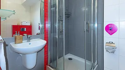 Łazienka w obiekcie Vacation Club - Aleja Zwycięzców 6F Apartament 15