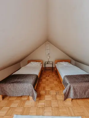 Łóżko lub łóżka w pokoju w obiekcie Pokoje hotelowe Azyl