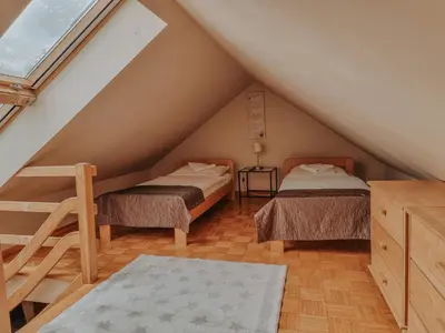 Łóżko lub łóżka w pokoju w obiekcie Pokoje hotelowe Azyl
