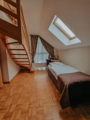 Łóżko lub łóżka w pokoju w obiekcie Pokoje hotelowe Azyl