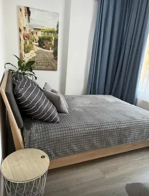 Łóżko lub łóżka w pokoju w obiekcie Apartament WITELONA