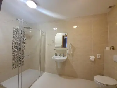 Łazienka w obiekcie Hotel Tenis