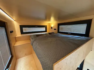 Łóżko lub łóżka w pokoju w obiekcie Czech Tinyhouse Lasówka