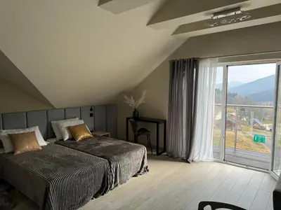 Łóżko lub łóżka w pokoju w obiekcie Apartament Buena Vista Czarna Góra Sienna