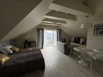 Łóżko lub łóżka w pokoju w obiekcie Apartament Buena Vista Czarna Góra Sienna