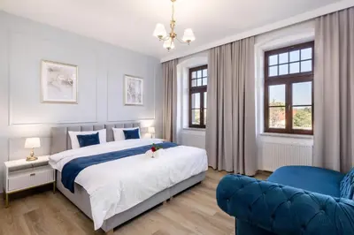 Łóżko lub łóżka w pokoju w obiekcie Vestium Apartment