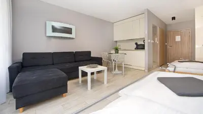 Łóżko lub łóżka w pokoju w obiekcie VacationClub - Solden Apartament 9