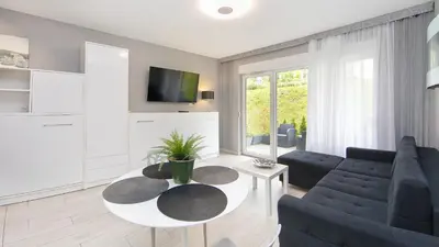 Telewizja i/lub zestaw kina domowego w obiekcie VacationClub - Solden Apartament 9