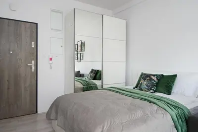 Łóżko lub łóżka w pokoju w obiekcie Apartament Lubliniecka z Pięknym Widokiem na Radiostację
