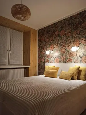 Łóżko lub łóżka w pokoju w obiekcie Słoneczny apartament z prywatną sauną w Stroniu Śląskim