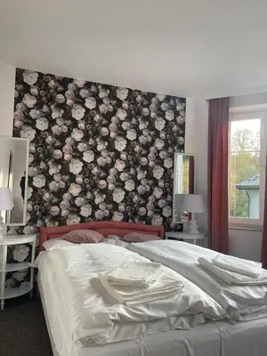 Łóżko lub łóżka w pokoju w obiekcie Apartamenty Przy Potoku