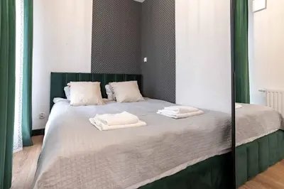 Łóżko lub łóżka w pokoju w obiekcie WrocApartments WestCenter - Parking Free