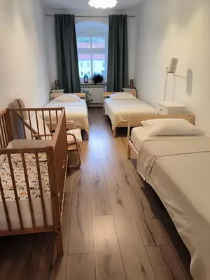 Łóżko lub łóżka w pokoju w obiekcie Apartament pod Wieżą Srebrna Góra