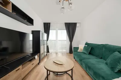Telewizja i/lub zestaw kina domowego w obiekcie Stylowy Apartament z Widokiem Browary Wrocławskie by Renters Prestige