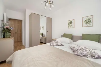 Łóżko lub łóżka w pokoju w obiekcie Stylowy Apartament z Widokiem Browary Wrocławskie by Renters Prestige